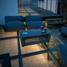 Terrasse extérieure moderne avec sol en verre trempé éclairé, mobilier confortable et ambiance relaxante