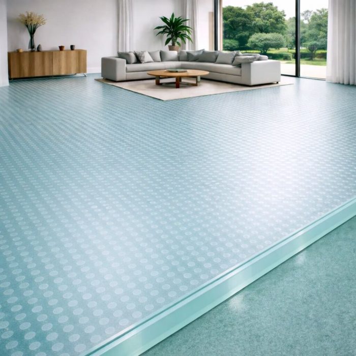 Plancher en verre trempé transparent de 39 mm avec texture de petits cercles, créant d'intéressants jeux d'ombres et de reflets.